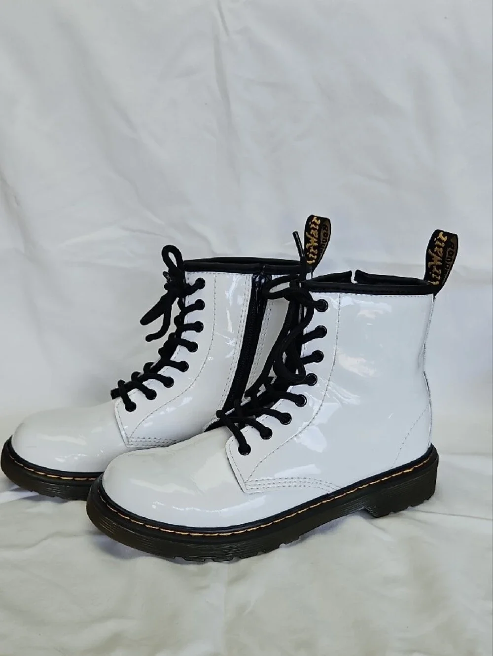 Dr. Martens White Patent Lace-Up Boots with Black Laces